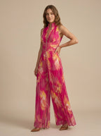 FIORELLA | TUTA PLISSETTATA FUCSIA
